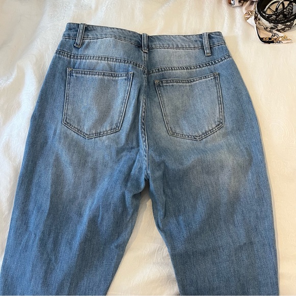 Jeans with holes - Picture 6 of 6